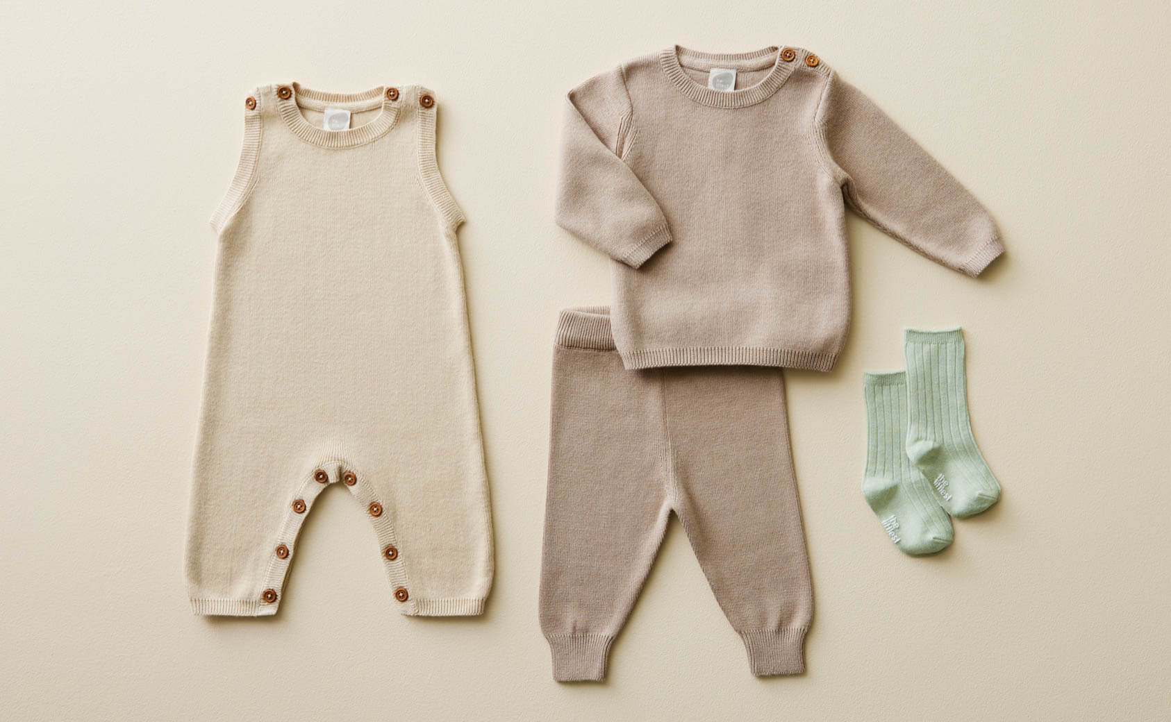 the littlest - Our exclusive line of sustainable accessories and clothing designed to keep baby comfortable and cozy.