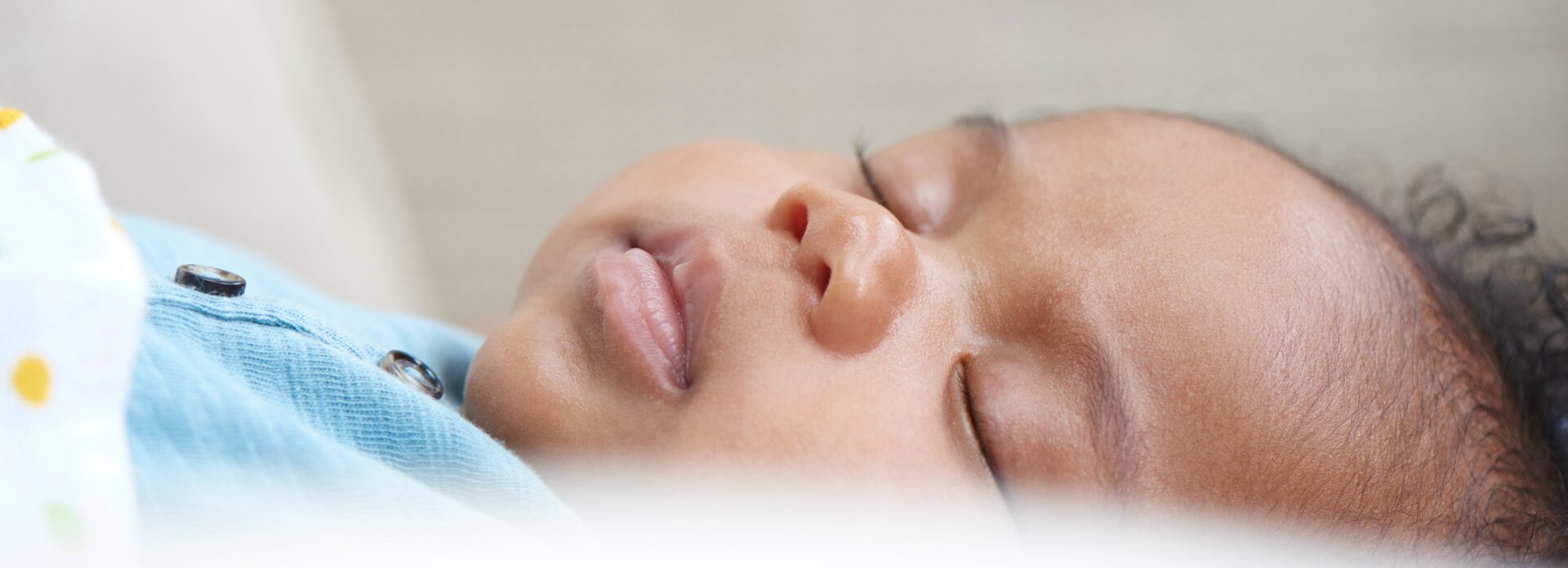 A close-up of a sleeping baby.