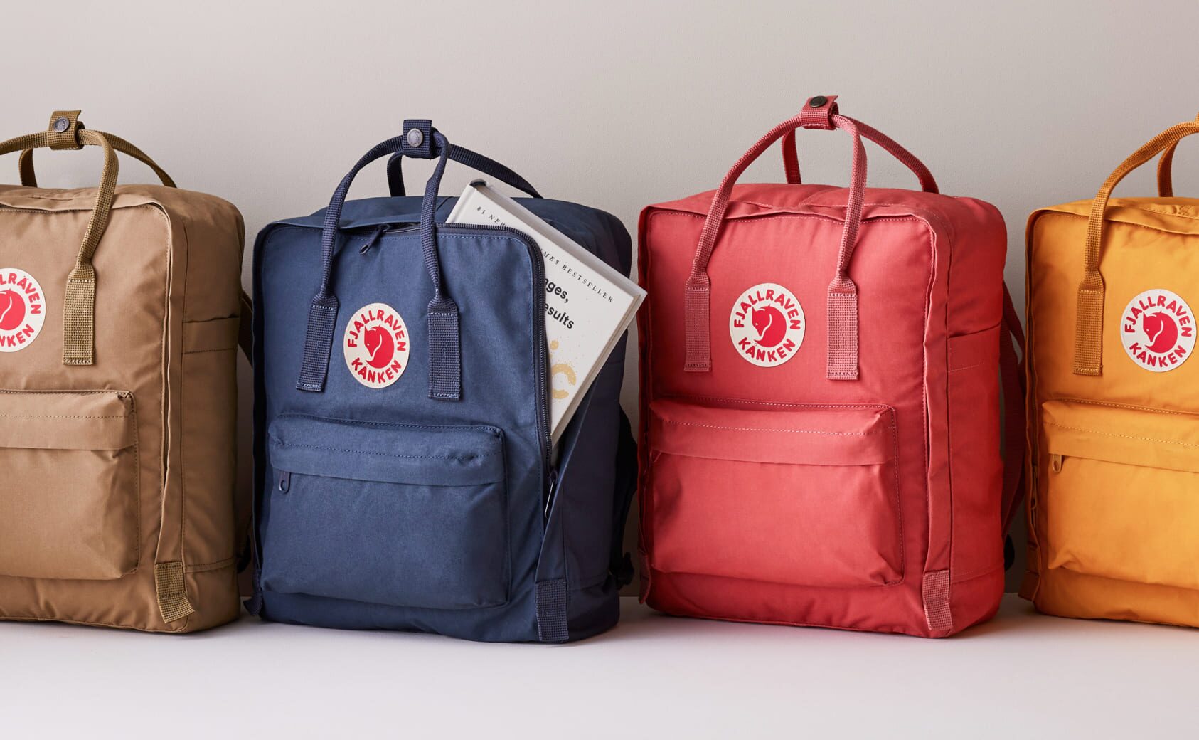 Fjallraven backpacks in bright colours.