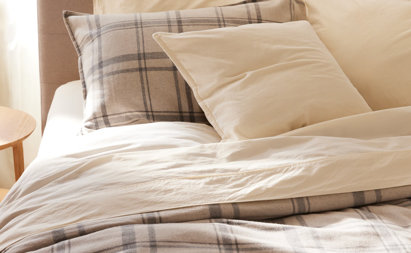 Bed with OUI organic cotton flannel bedding.