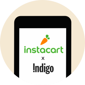 An illustrated hand holding a shopping bag with the Indigo logo on it.