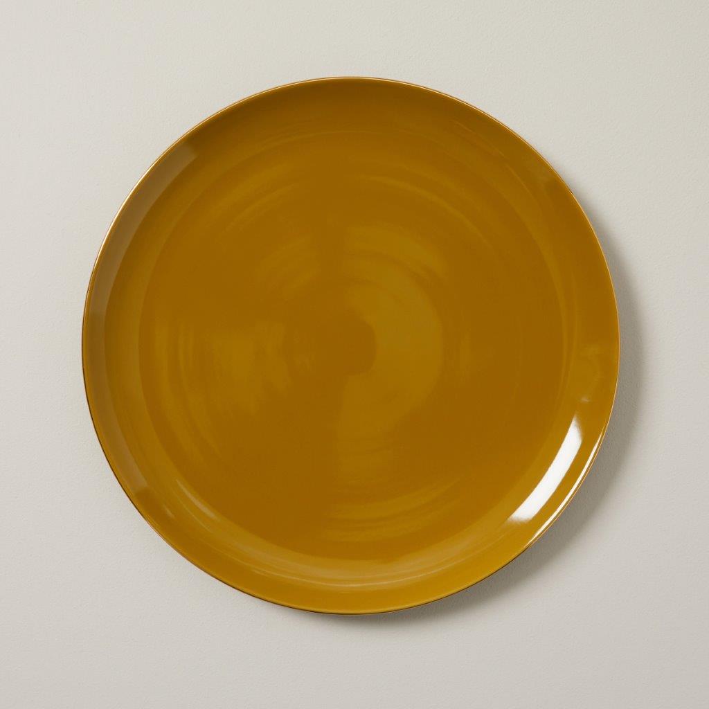 A picture containing cup, orange, indoor, tableware

Description automatically generated