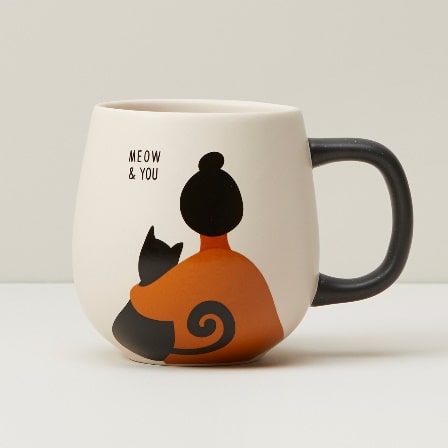 A coffee mug with a cartoon character on it

Description automatically generated with low confidence